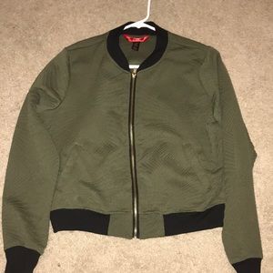 Green and black sweatshirt